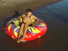 AlphaTeenies presents: Beautiful fresh faced teen plays at the beach nude