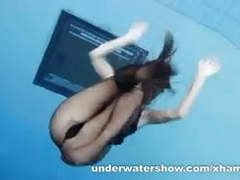 AlphaTeenies presents: Zuzanna is swimming in pantyhose in the pool
