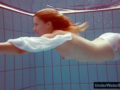 AlphaTeenies presents: Redhead in a white dress and sexy bikini