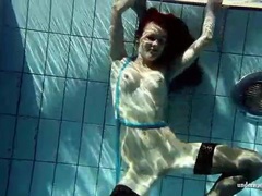 AlphaTeenies presents: In black stockings pretty girl goes for a swim