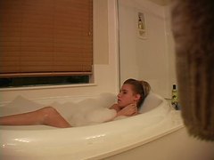 AlphaTeenies presents: Hidden camera captures girl masturbating in bathtub