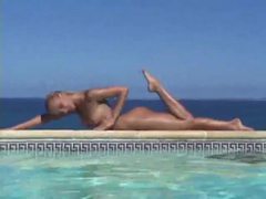 AlphaTeenies presents: Blonde strips from bikini and takes a dip