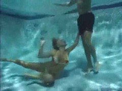 AlphaTeenies presents: She has a threesome underwater