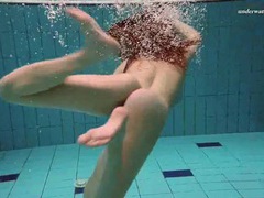 AlphaTeenies presents: Underwater with a busty naked babe as she swims