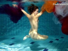 AlphaTeenies presents: Artful naked underwater show with a hairy pussy girl