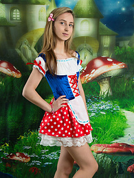 AlphaTeenies presents: Very hot blonde teen beauty in an adorable outfit slowly takes it off to reveal her nice and perky boobs