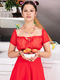 AlphaTeenies presents: Slim teen girl poses in sexy red outfit and takes it off to present her tits, ass and pussy